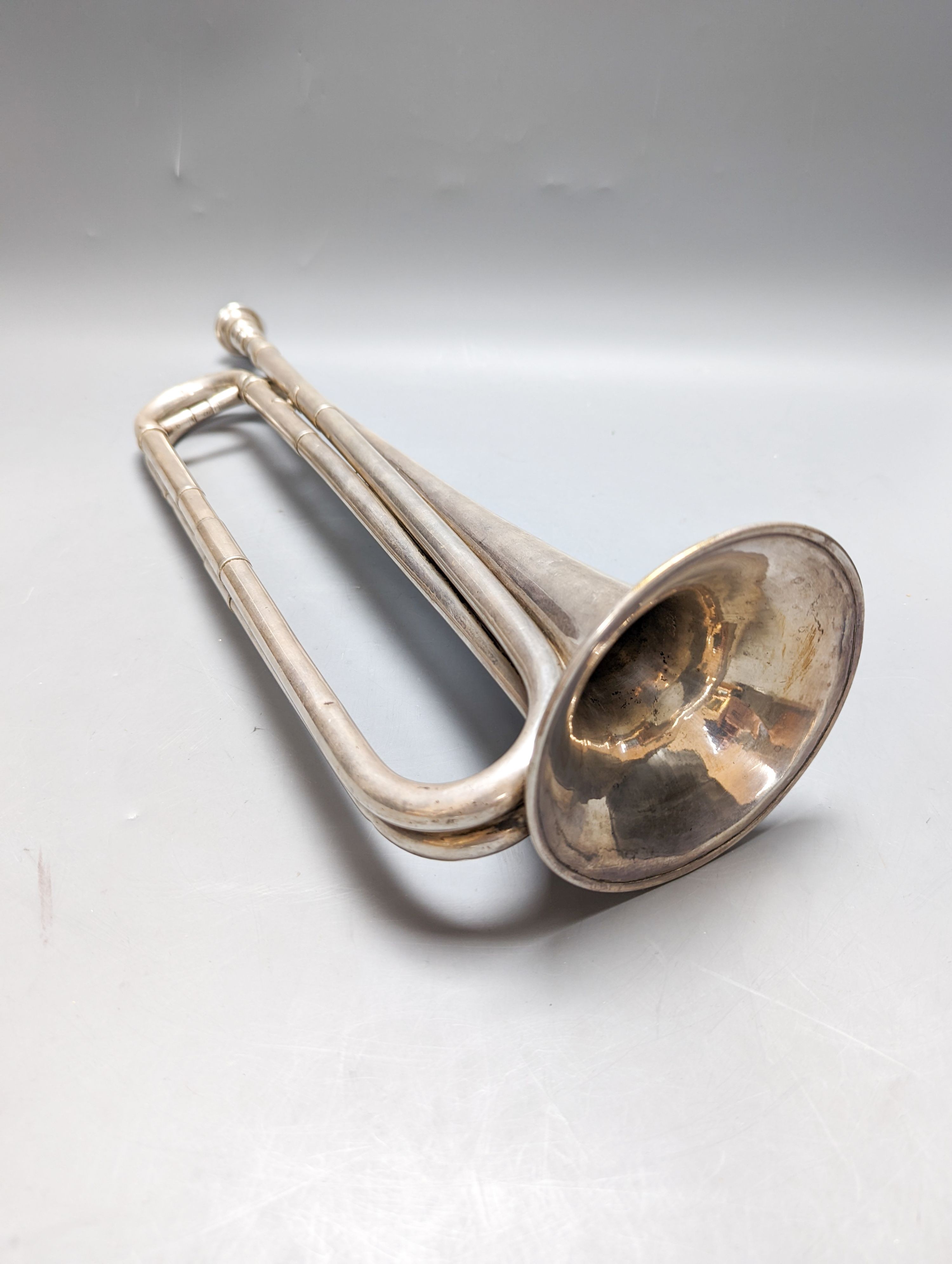 A Rudall Carte & Co manufacturers 23 Berners Street Oxford Street London No.4084 military bugle or cavalry trumpet, 43cm